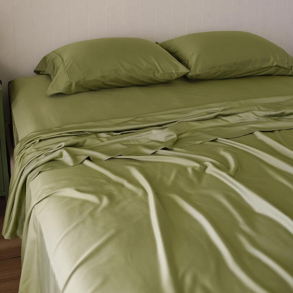 Unstyled bed dressed in the Fern 100% Bamboo Sheet Set, showing sheets and pillowcases.